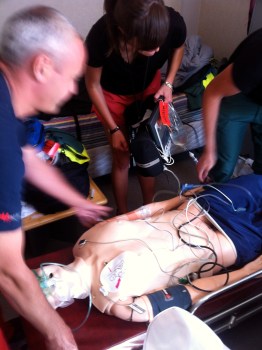 The team moving the patient onto the stretcher - ready for transport. Pads in place and ready for anything! Picture is a bit blurry because the team was moving with such efficiency & speed! 