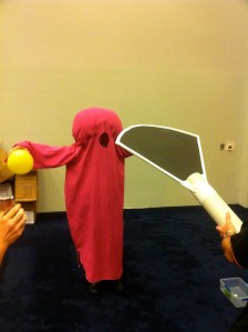 Our team was introduced to the teaching props we were required to use. The red figure represents a uterus with yellow ovaries while the ultrasound probe is in the foreground. We were required to incorporate these into our teaching session. 